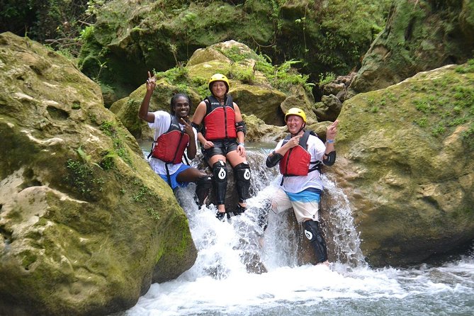River Rapids Waterfalls Rafting and Beach Adventure - Passing beneath the old stone bridge