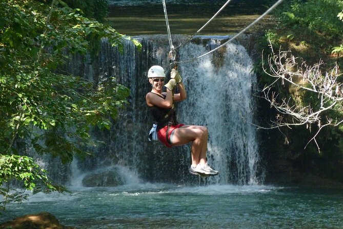 Zip-lining/Horseback Rides/Cat & Atv Inclusive Act with Transpo From Montego Bay - Ziplining above western Jamaica