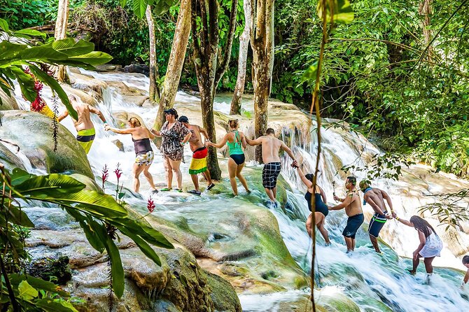 Zipline, Dunn’s River Falls, Bamboo Rafting & Horseback Ride Tour - Dunn’s River Falls and zipline over the water